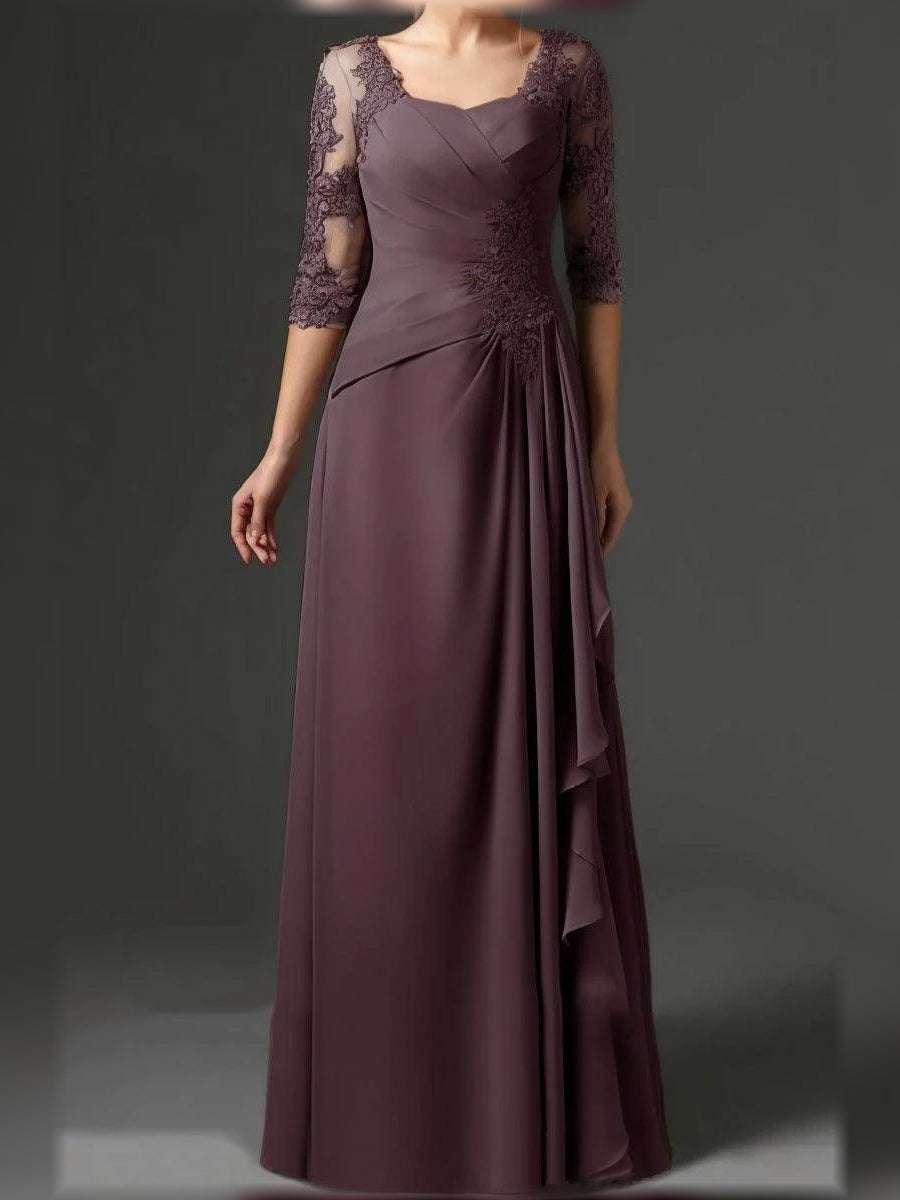 Mauve chiffon A-line mother of the bride dress with square neck, lace sleeves and draped ruching.