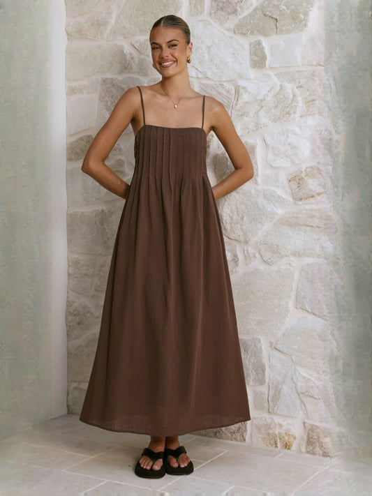 Brown A-line maxi formal dress with thin straps and square neckline, front view with smile