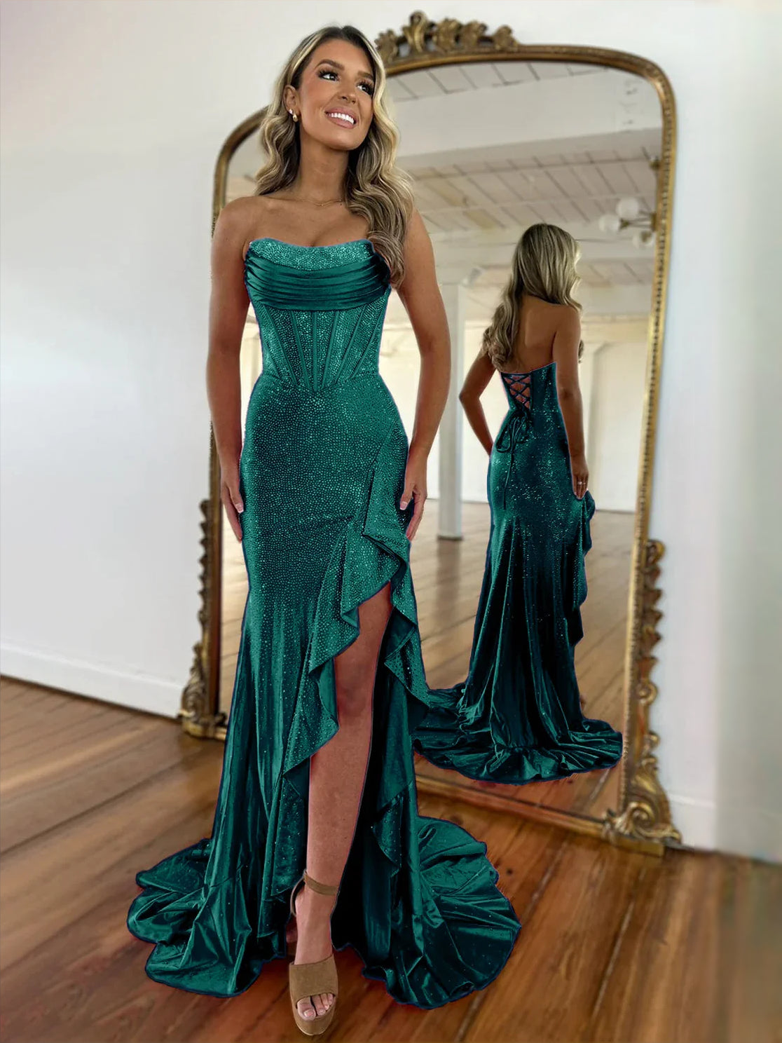 Emerald green sweetheart mermaid prom dress with draped bodice and ruffled slit skirt