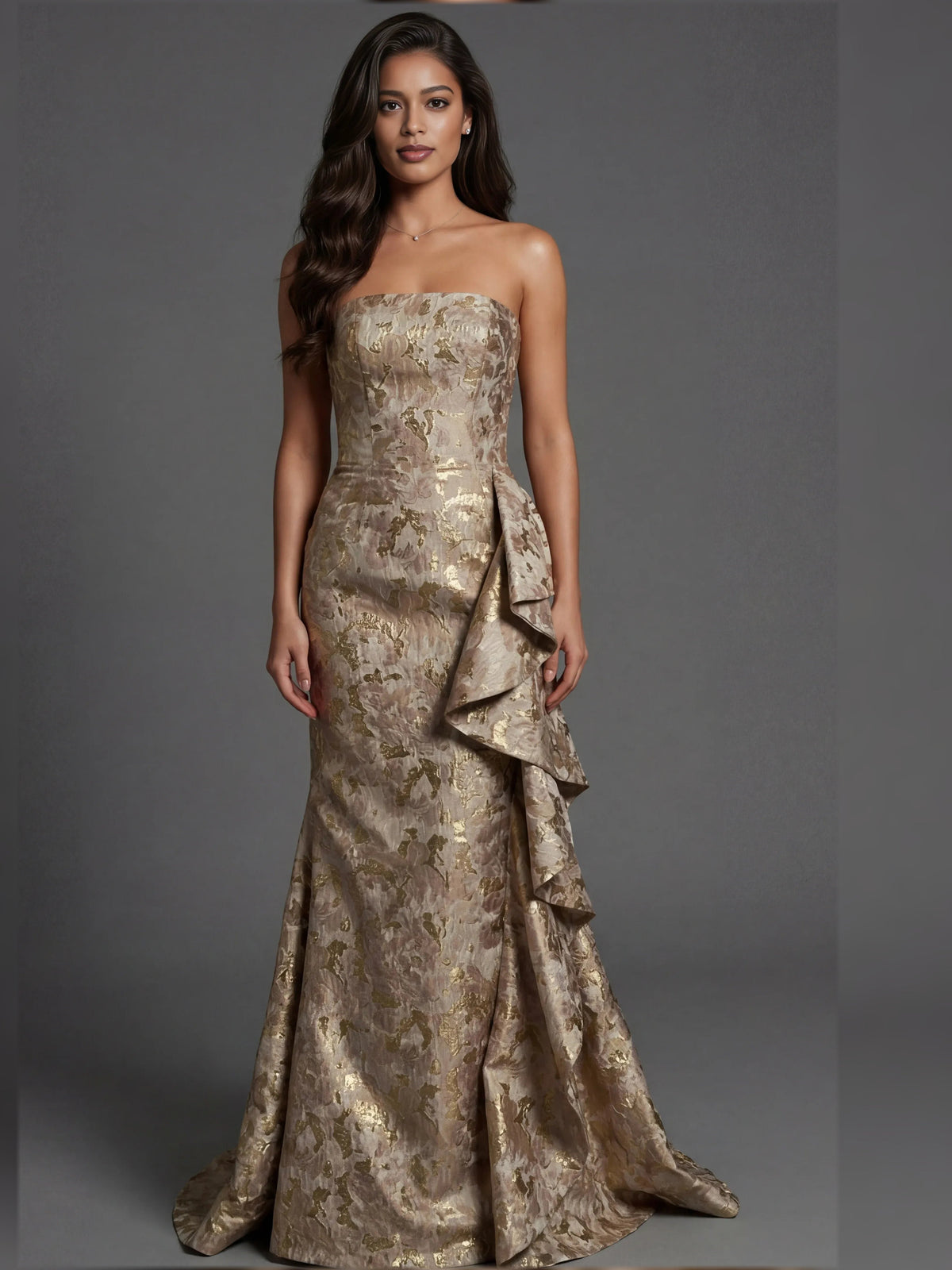 Front view strapless mermaid dress with metallic gold ruffles and draped skirt, floor-length.