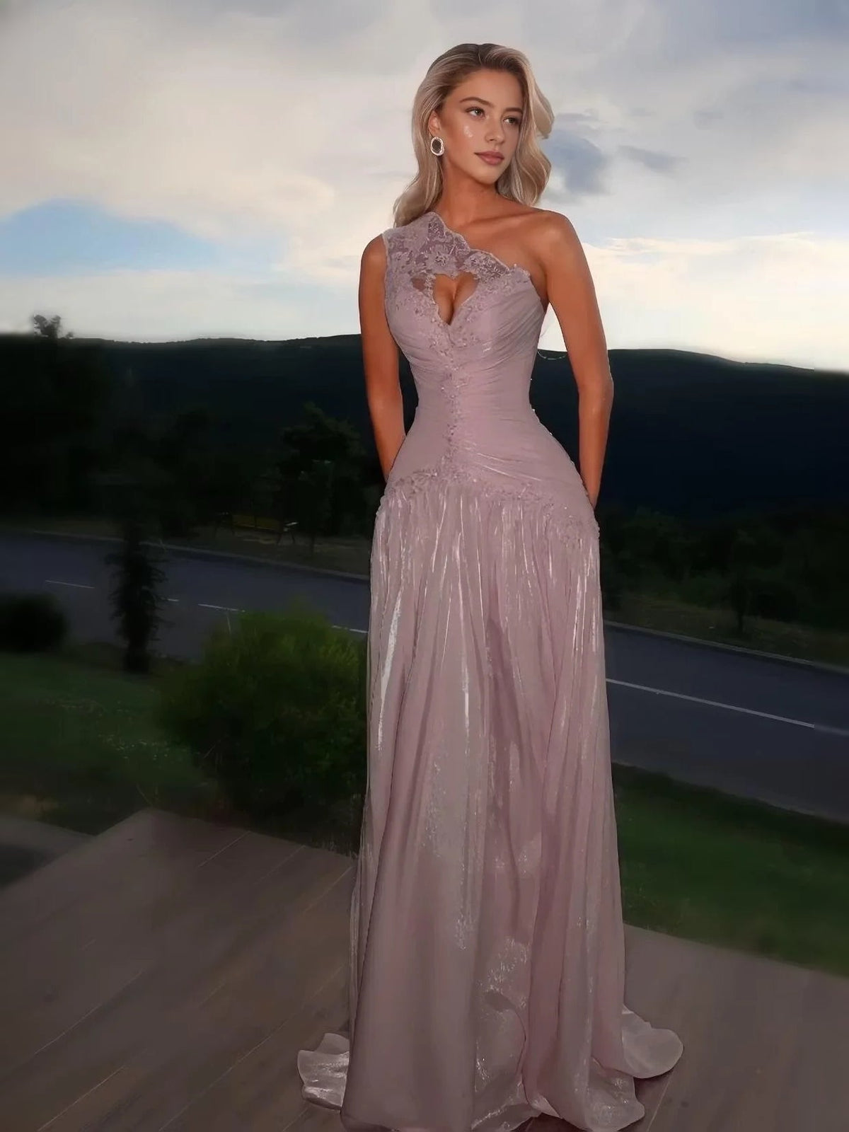 Blush pink one-shoulder prom dress with ruched bodice, heart floral applique, flowing A-line skirt