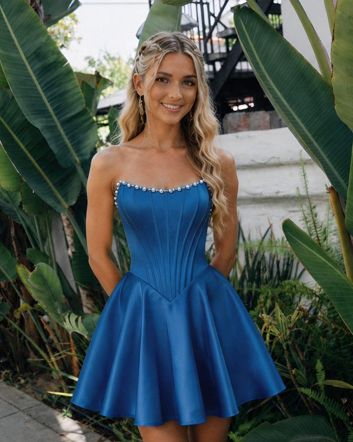 Cobalt blue satin strapless corset dress with pearl trim and flared homecoming skirt