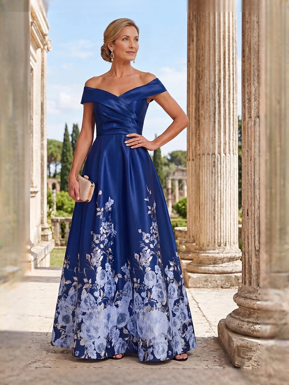 Off-shoulder satin A-line floor-length gown in navy with blue floral print skirt, front view