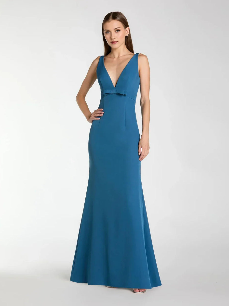 Ocean blue sleeveless V-neck mermaid formal dress with fitted waist, floor-length