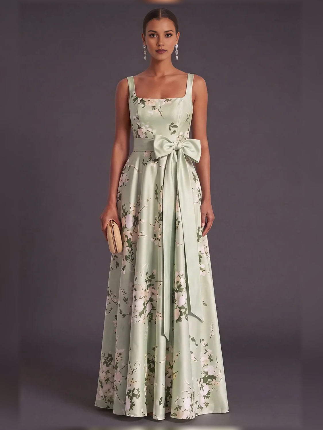 Sage green floral A-line formal dress with square neckline, spaghetti straps and bow