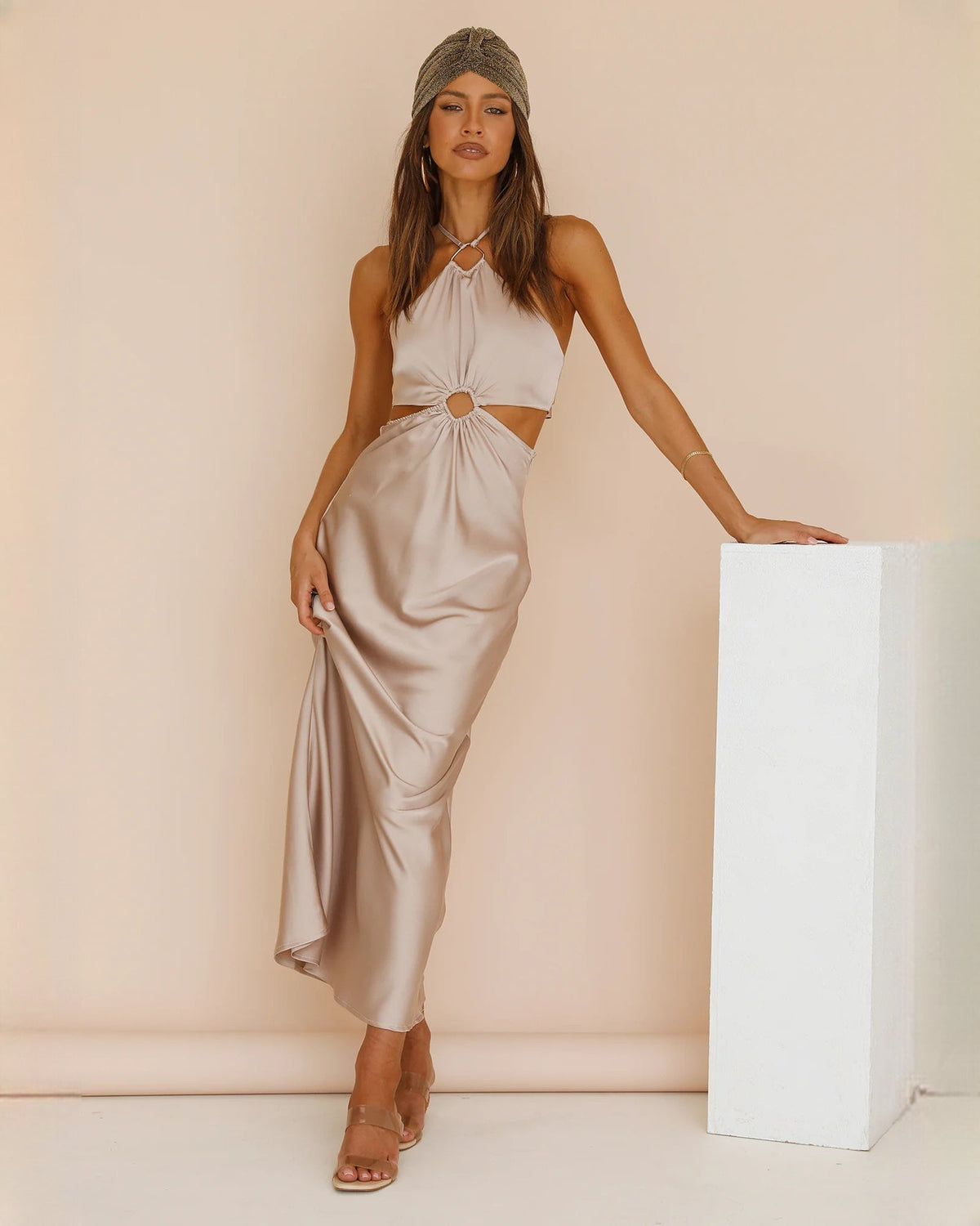 Ivory satin halter maxi dress with gathered bodice and draped waist knot