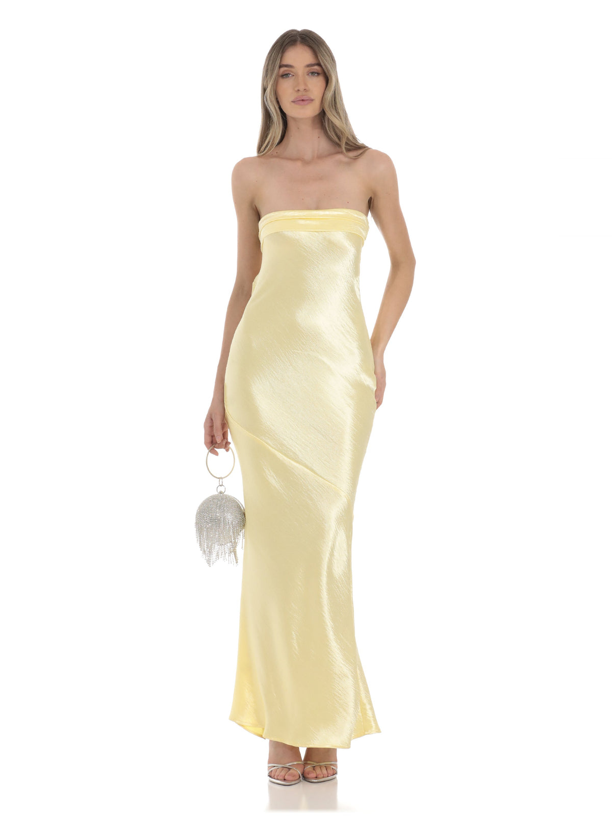 Yellow strapless satin A-line maxi dress with draped skirt and tassel earrings