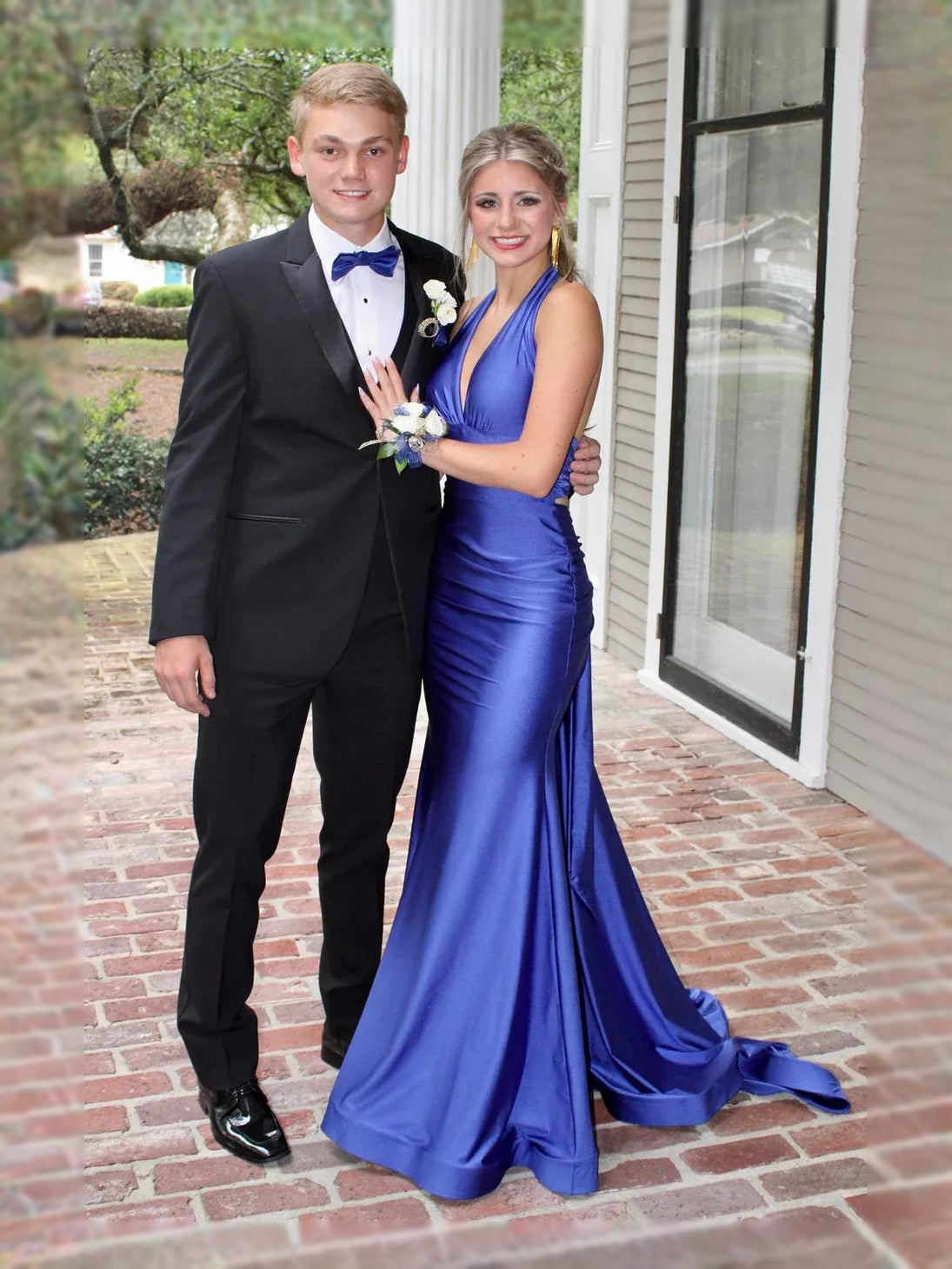Blue satin mermaid prom dress with V-neck, ruched bodice, draped open back, floor length