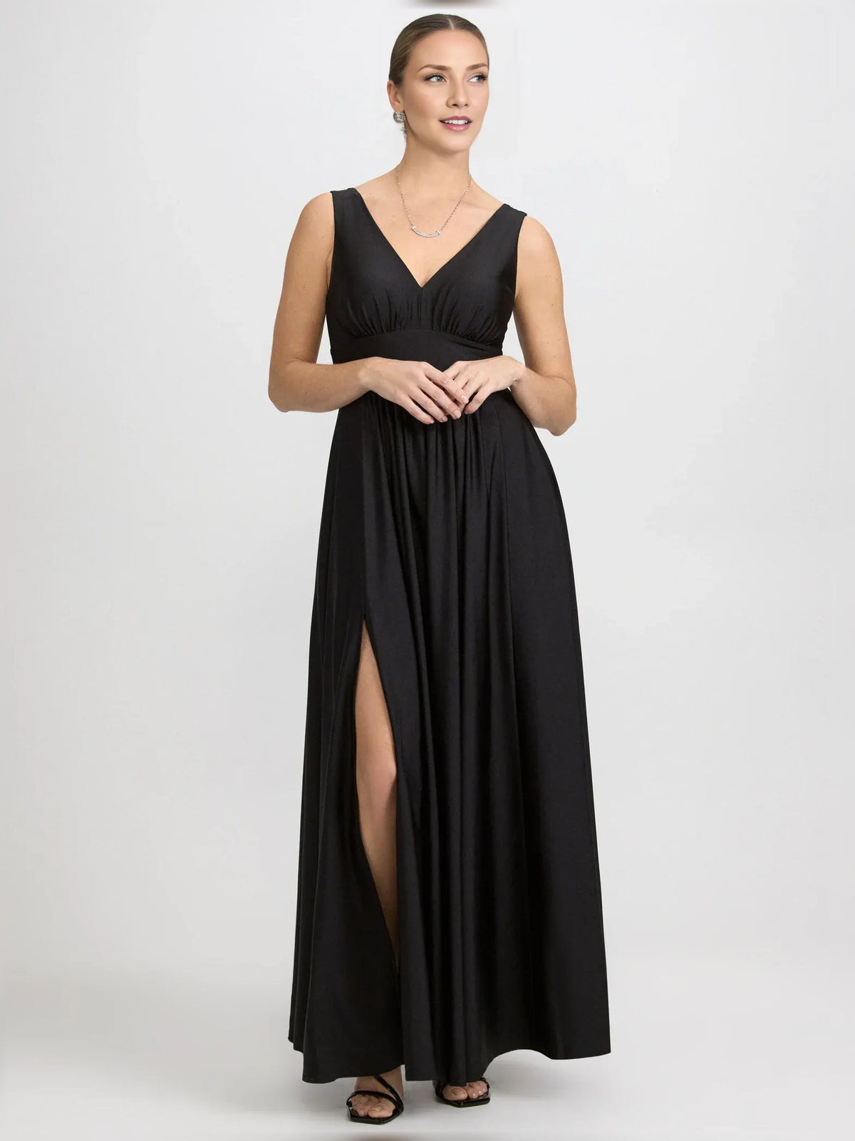 Black V-neck ruched floor-length formal dress with side slit, sleeveless and gathered waist