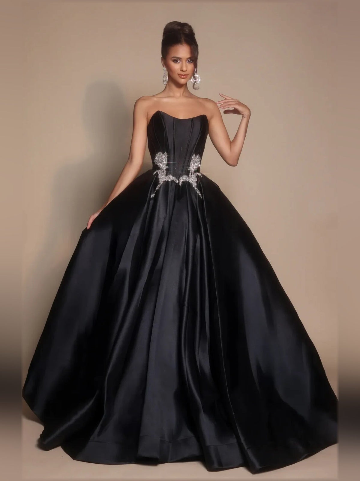 Black strapless satin ball gown with rhinestone floral waist and voluminous skirt