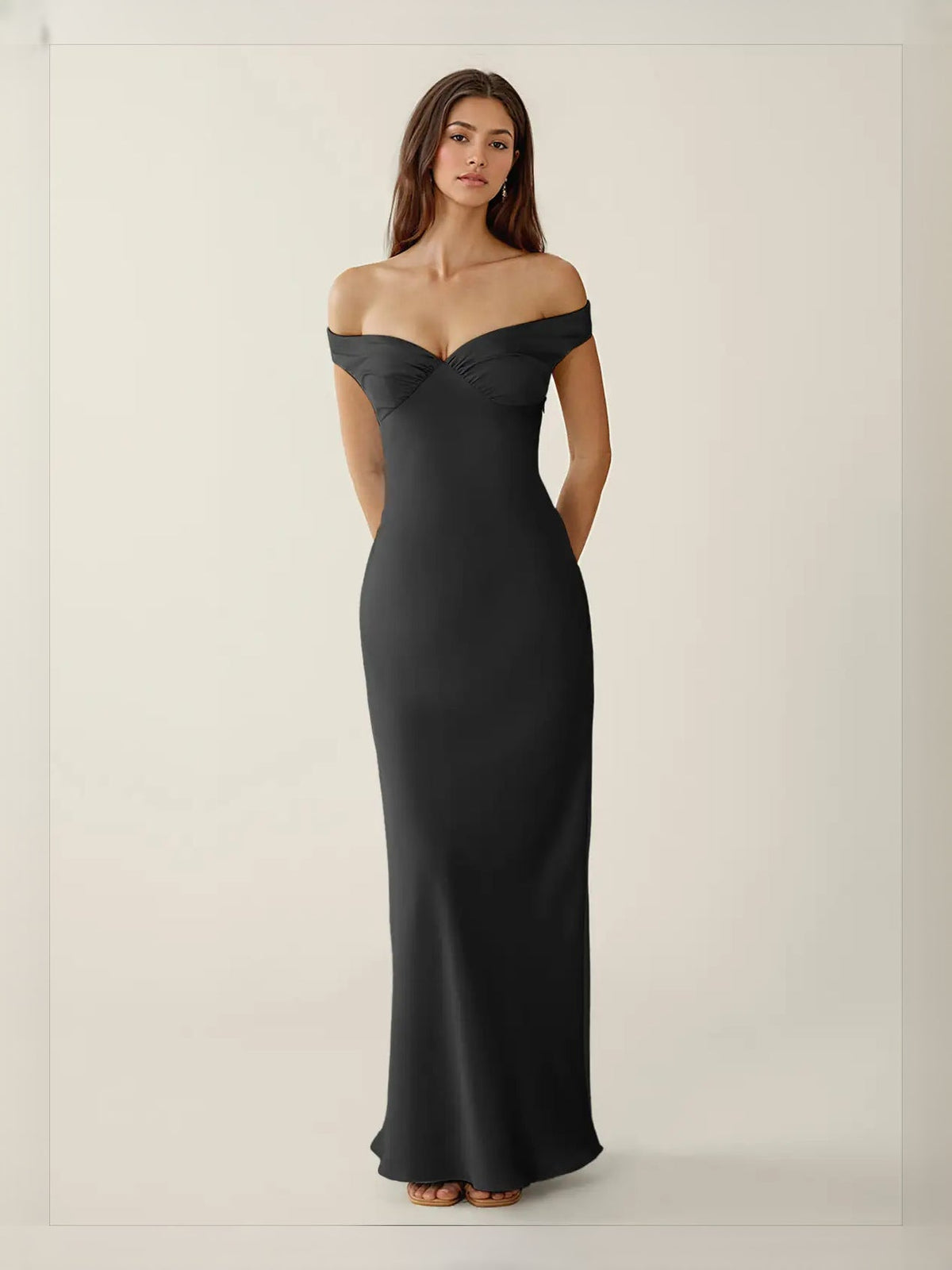 Black off-shoulder satin maxi dress with fitted column skirt and ruched neckline