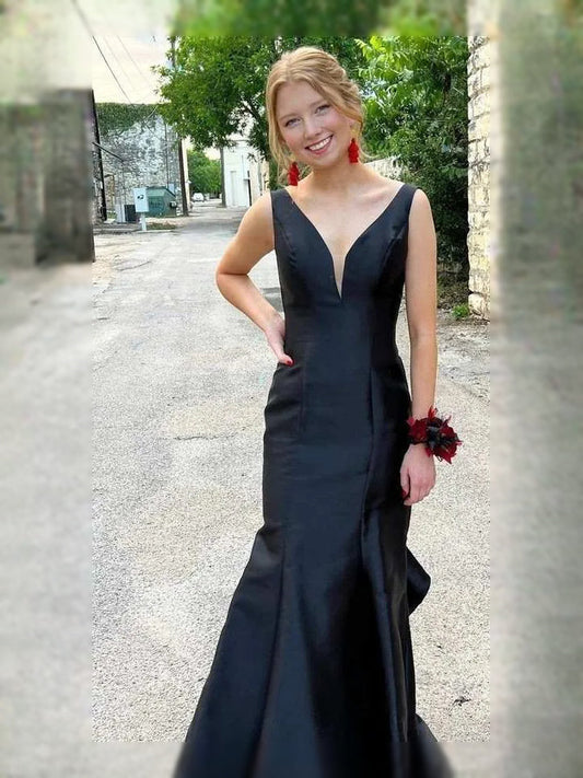 Black satin mermaid maxi dress with open back, draped bodice and ruffle hem