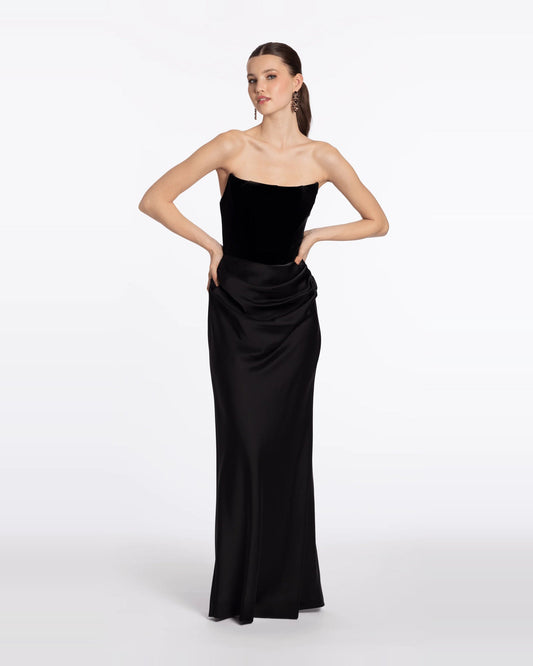 Black strapless corset maxi prom dress with gathered ruched drape at the waist