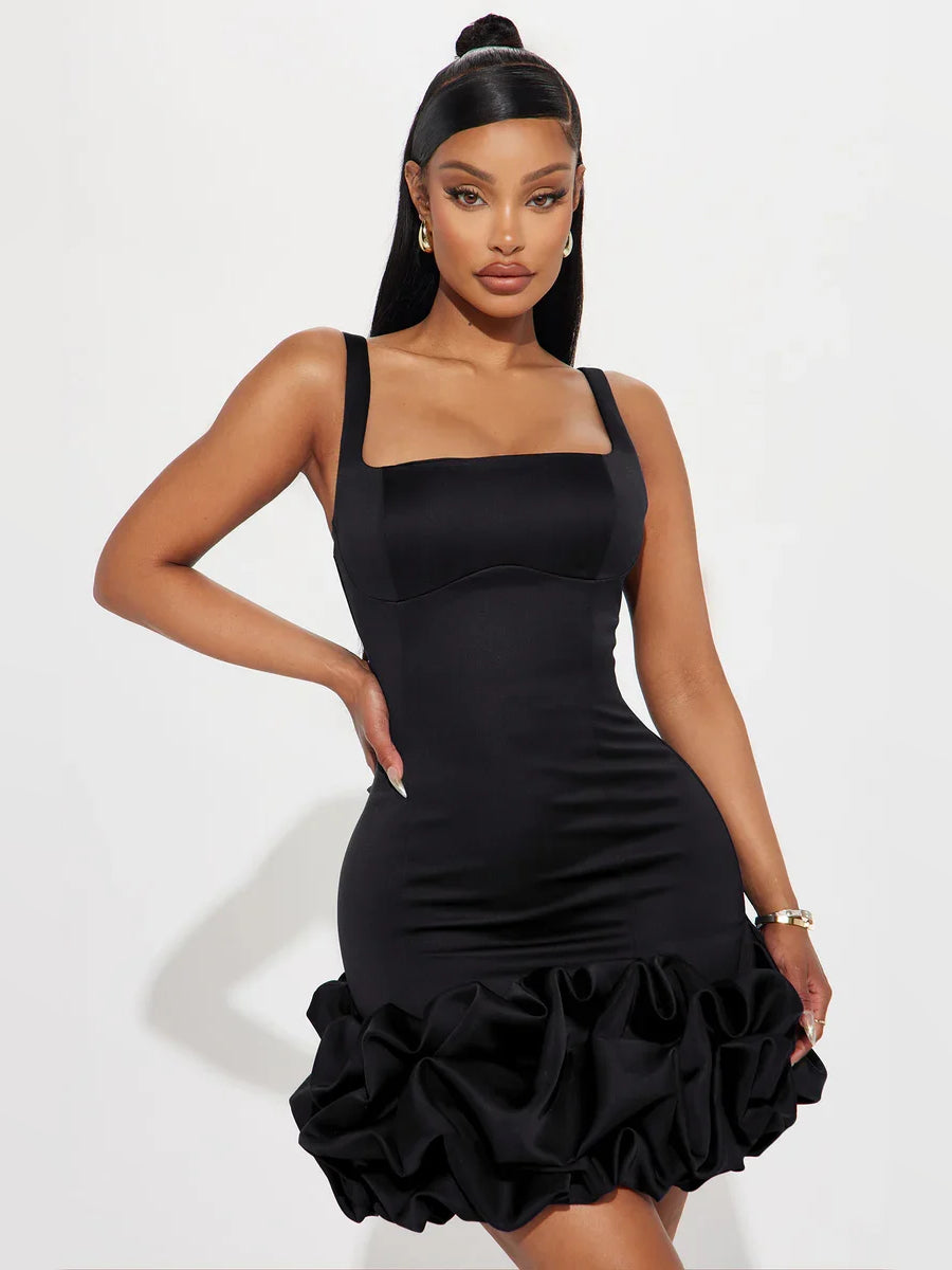 Black satin mini dress with square neckline and layered ruffle skirt