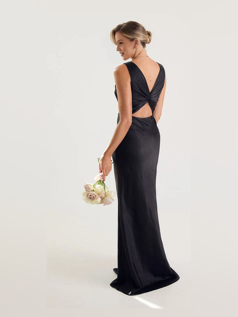 Black satin V-neck sheath maxi dress, sleeveless, open-back twist and low back.
