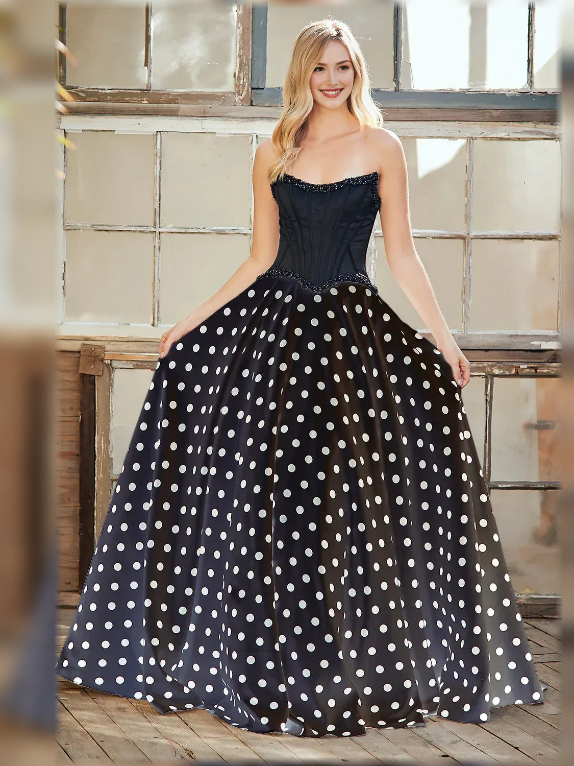 Black sweetheart corset formal dress with white polka-dot skirt, floor length