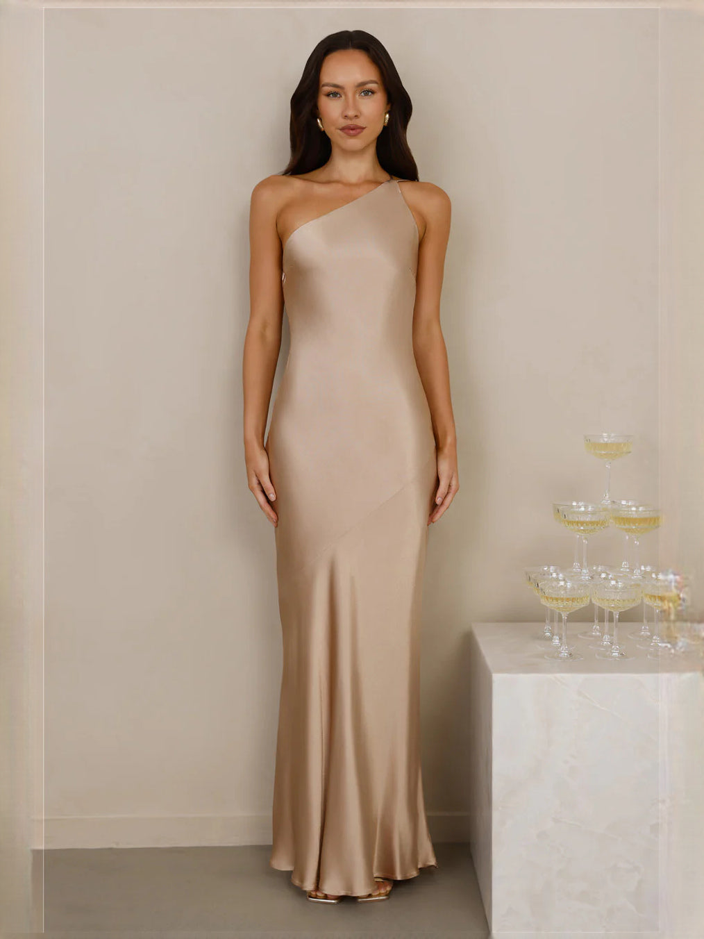 Champagne one-shoulder satin sheath maxi dress with fitted column silhouette