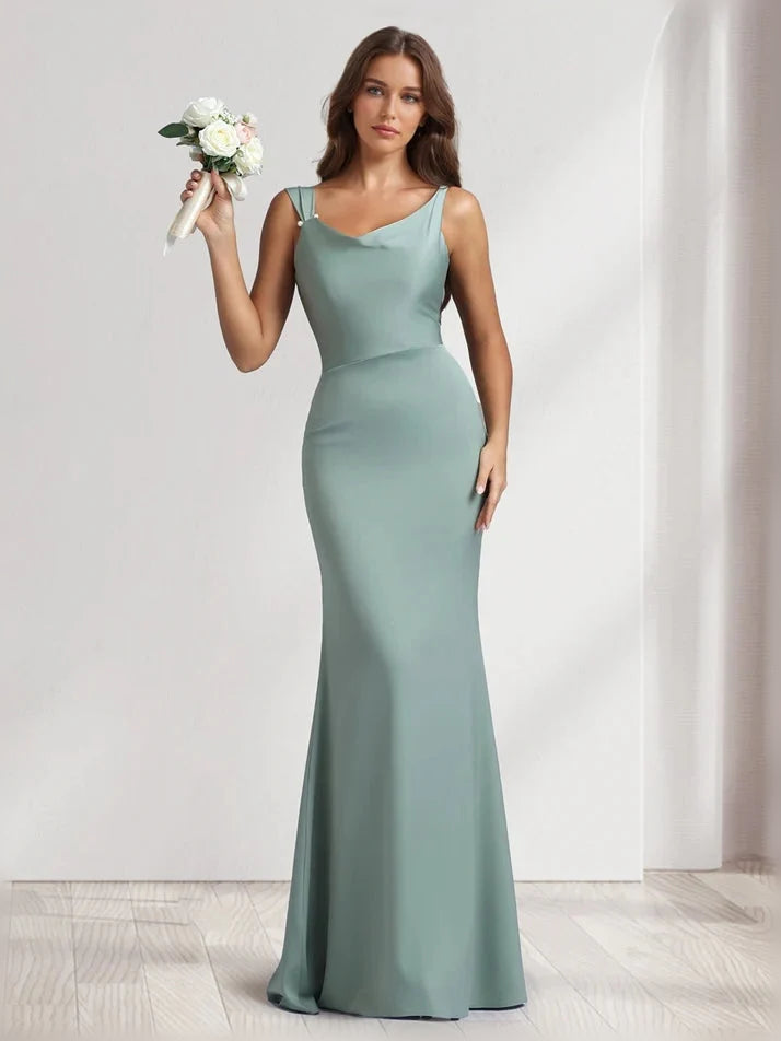 Dusty sage satin floor-length gown with thin straps and fitted mermaid skirt