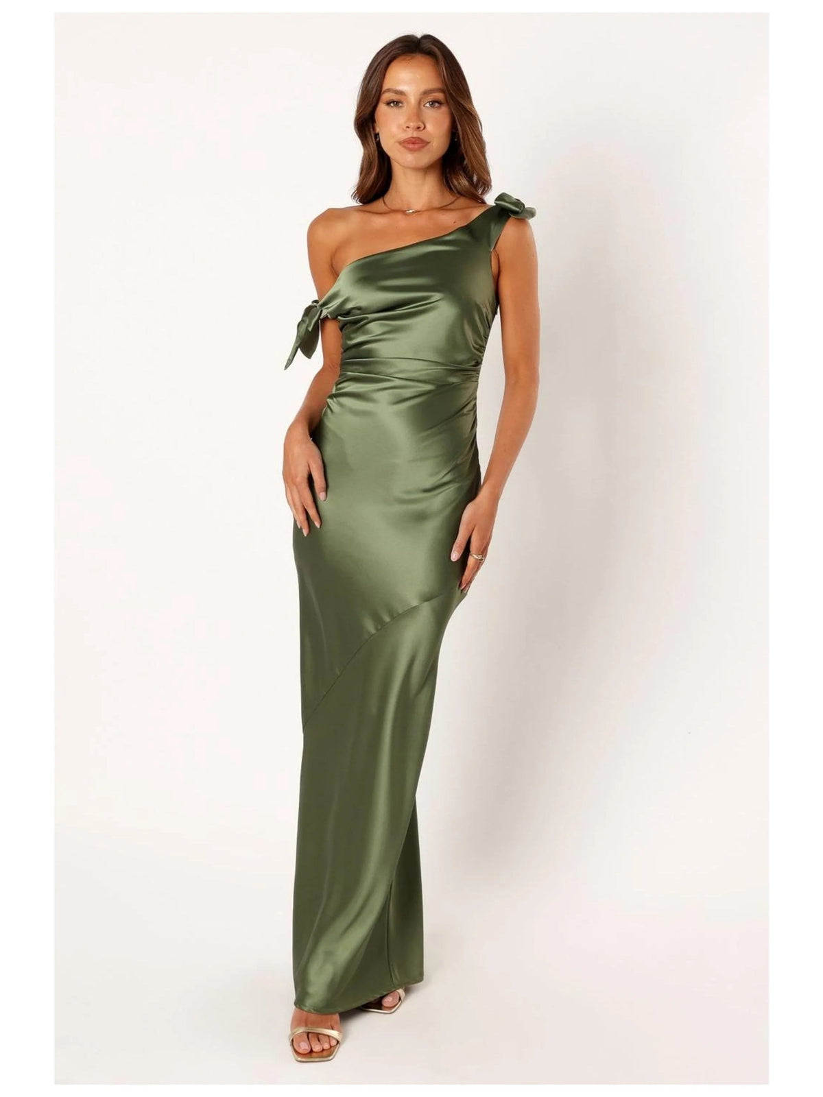Sage green satin one-shoulder mermaid gown with bow accent and ruched bodice