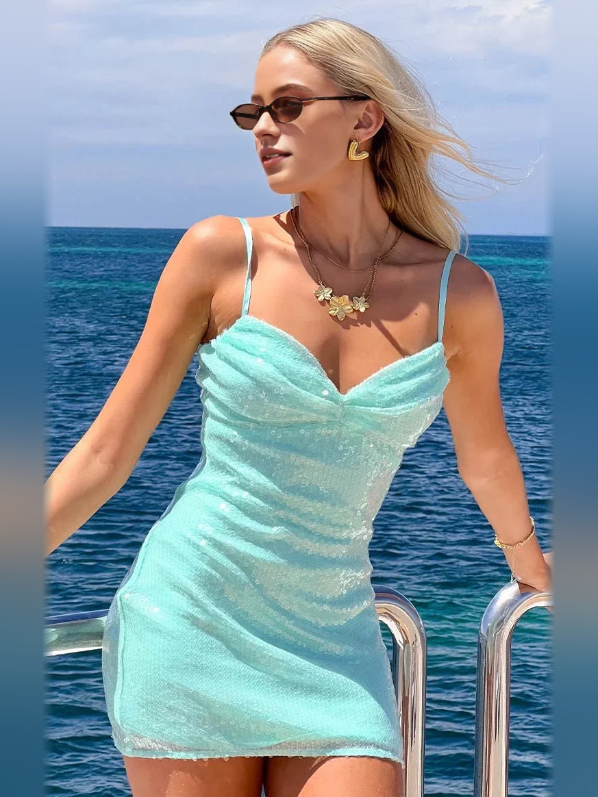 Mint sequined mini dress with ruched sweetheart neckline and thin spaghetti straps