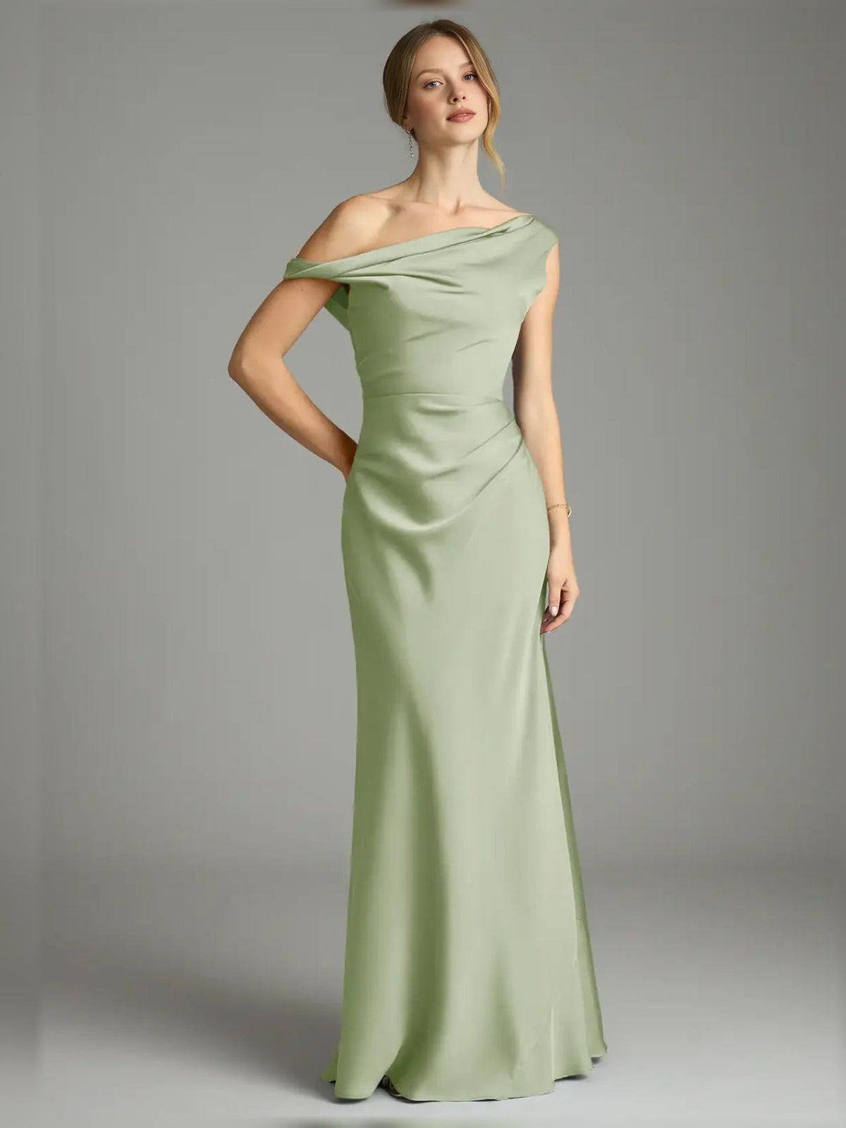 Sage green satin off-shoulder mermaid gown with pleated drape and fitted skirt