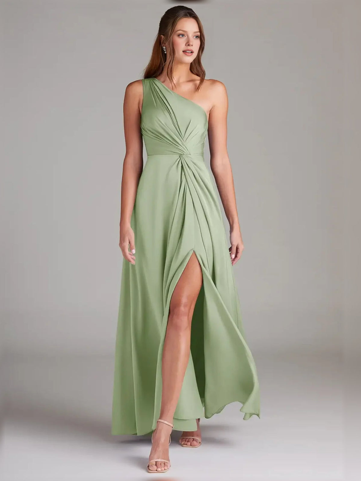 Dusty sage one-shoulder formal dress with twisted bodice, draped skirt and thigh slit.