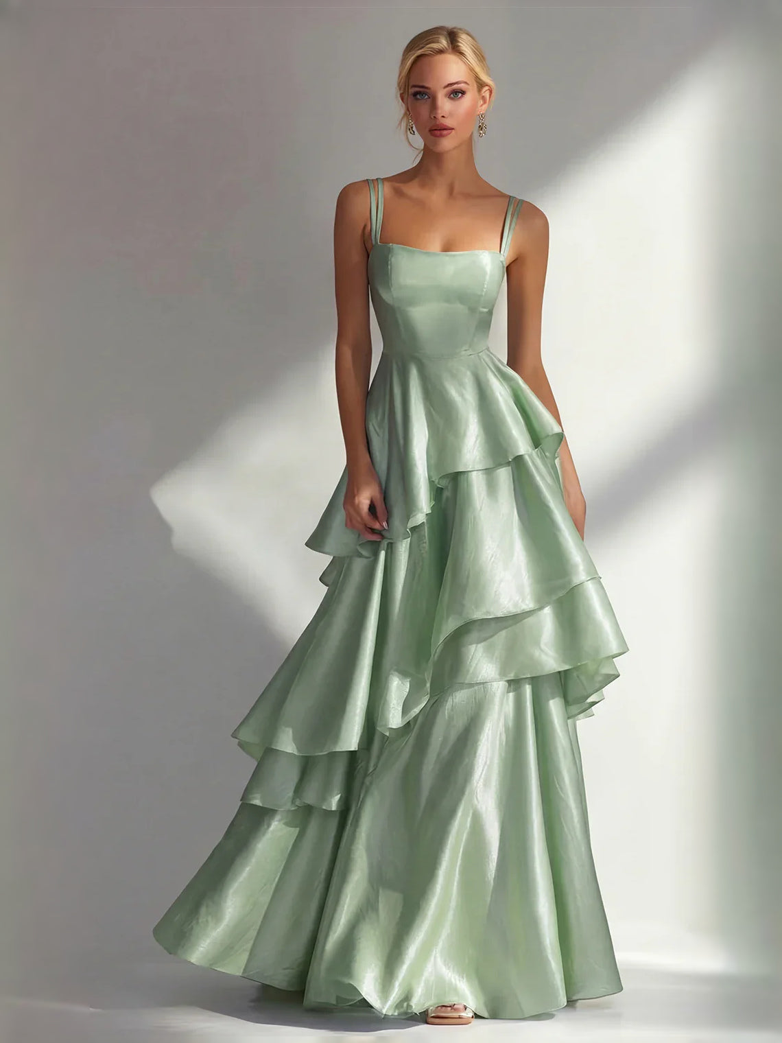 Light sage satin prom dress with square neckline, spaghetti straps, tiered ruffle A-line skirt