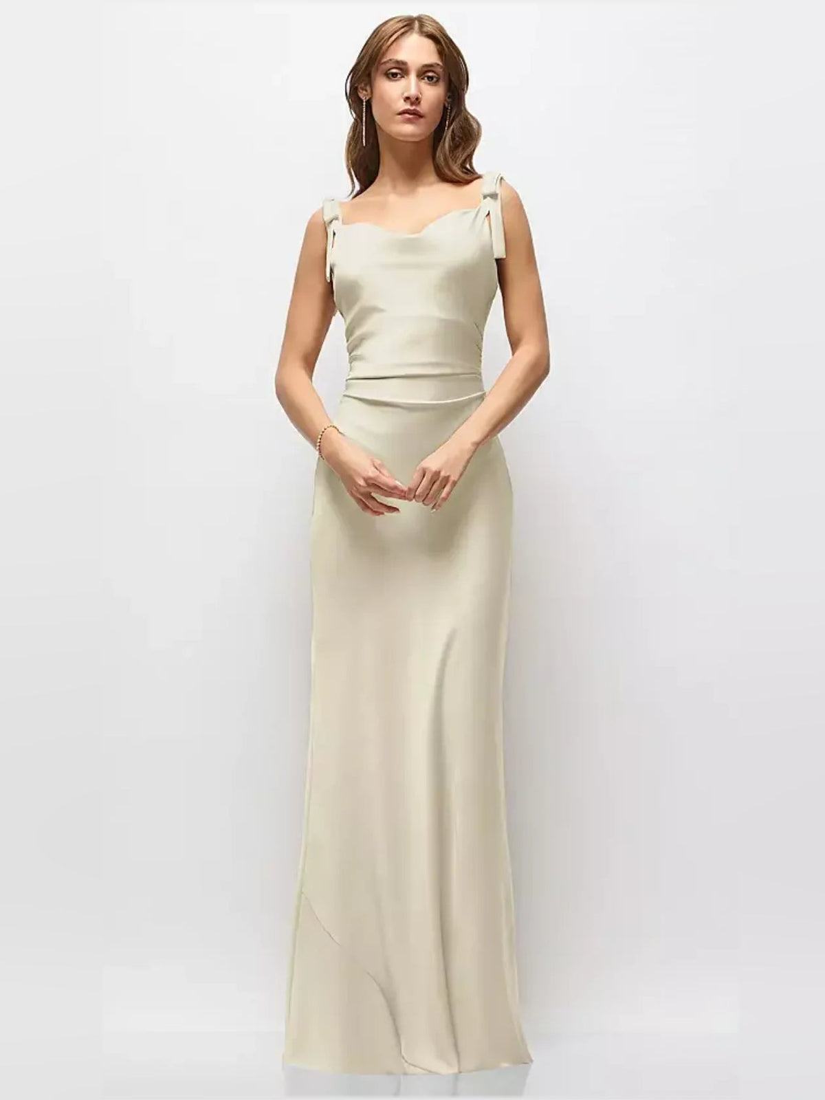 Champagne satin maxi dress with bow-strap shoulders and ruched bodice, fitted skirt
