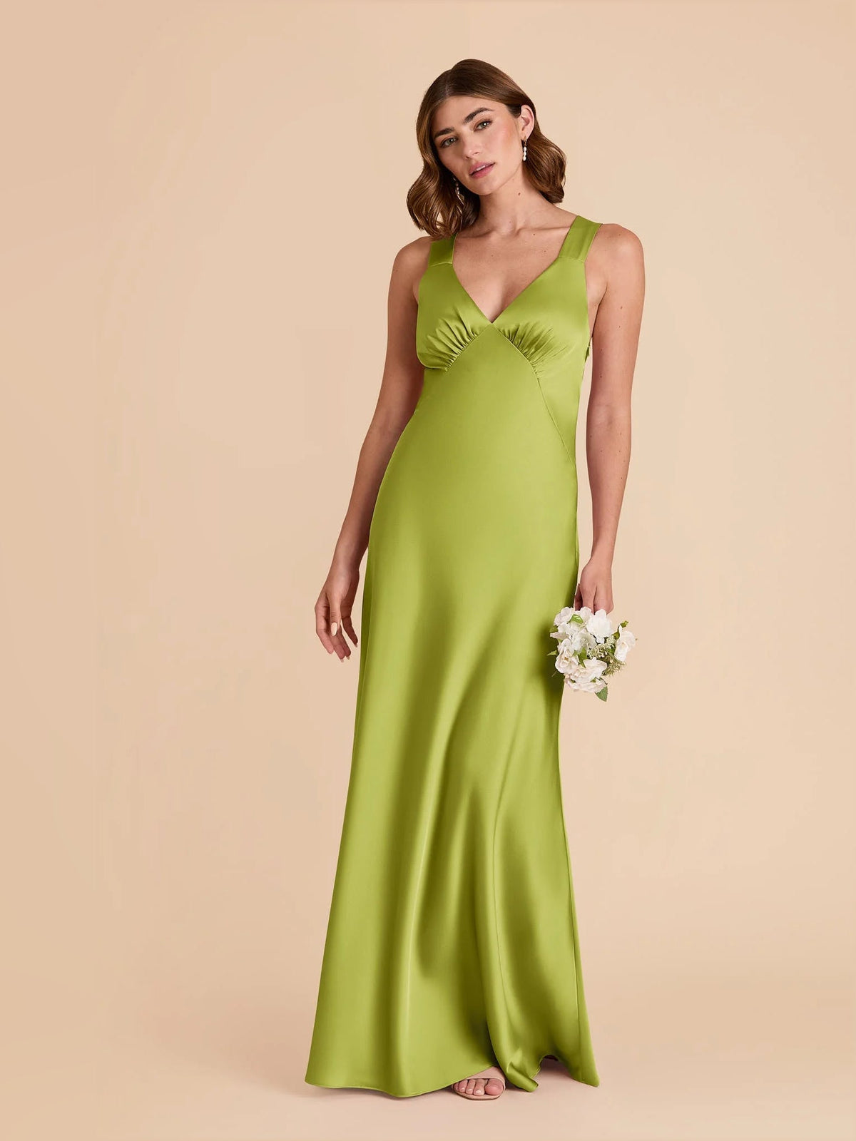 Sage green satin ruched V-neck A-line maxi bridesmaid dress, sleeveless, standing side view