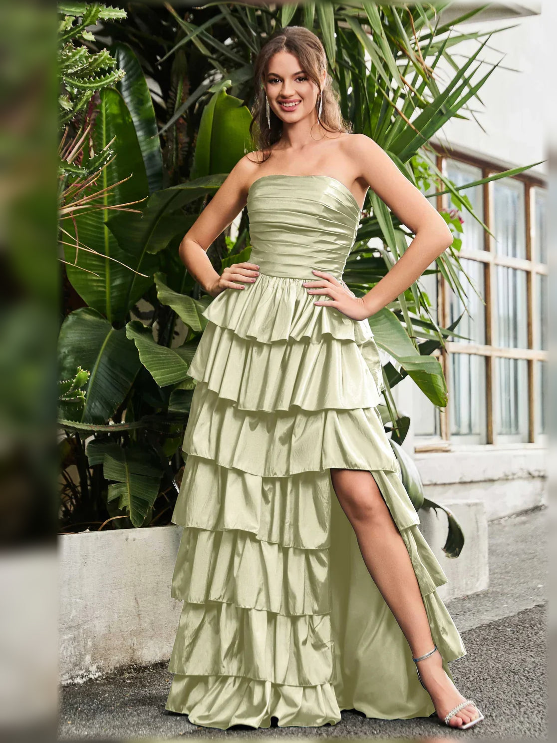 Sage green strapless tiered formal dress with ruching and layered ruffle skirt