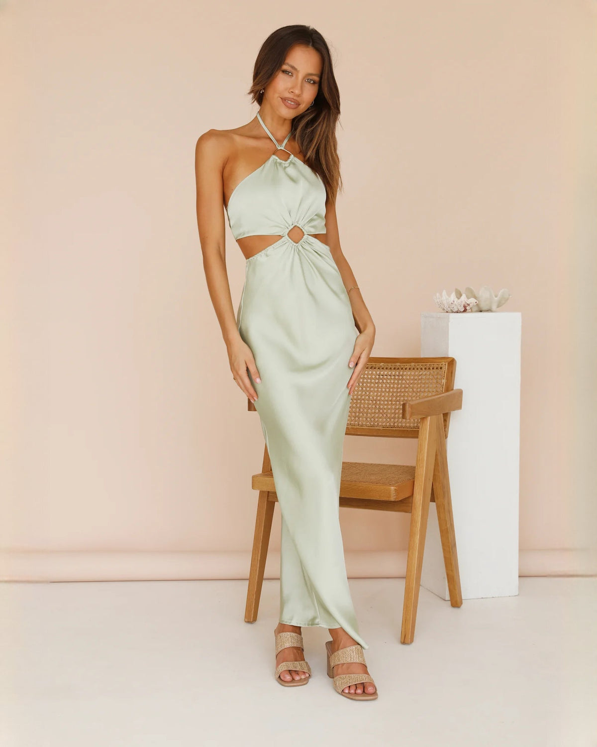 Mint green satin halter maxi dress with draped bodice and gathered waist detail