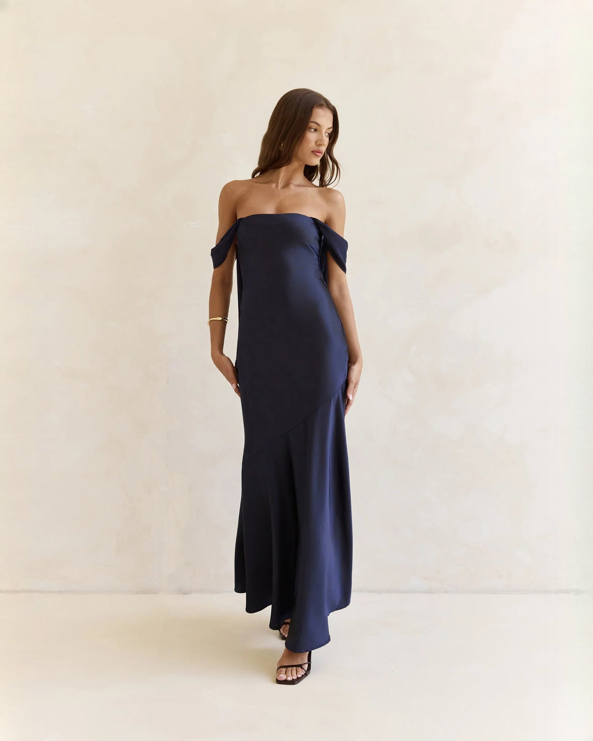 Navy satin off-shoulder A-line maxi dress with shoulder ties and front drape