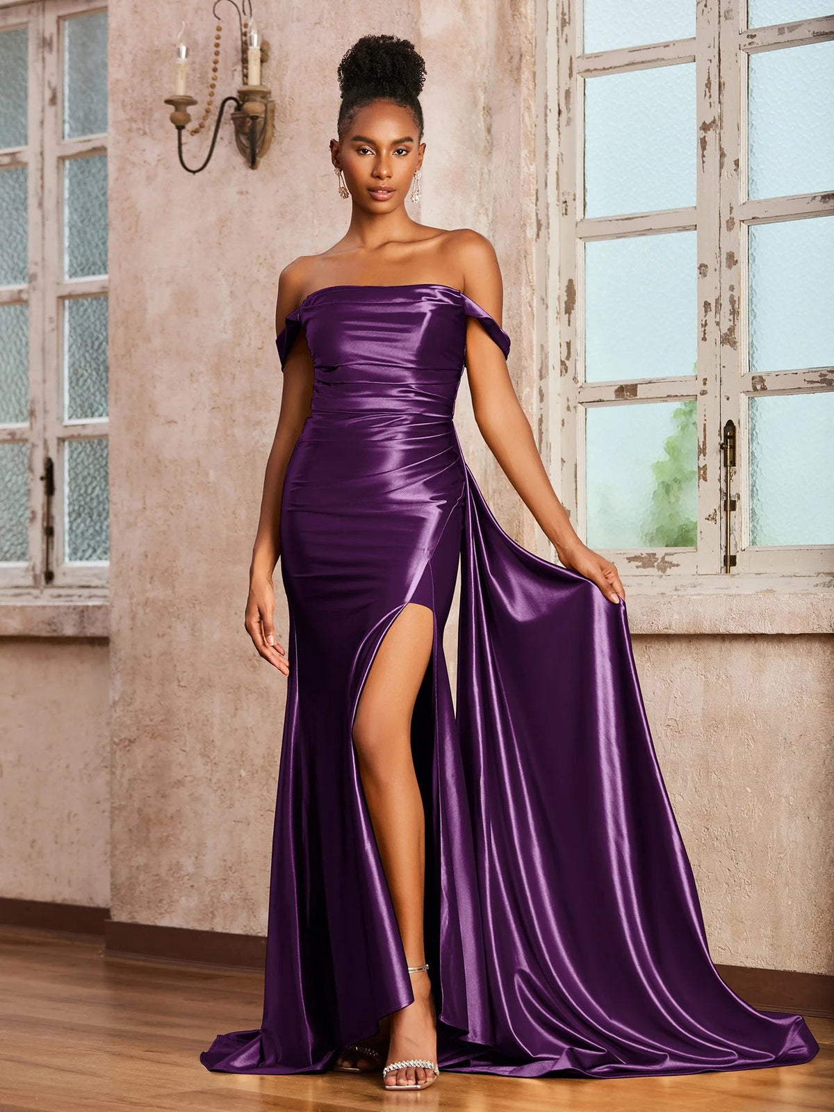 Purple off-shoulder satin formal dress with corset bodice, ruching, front slit.