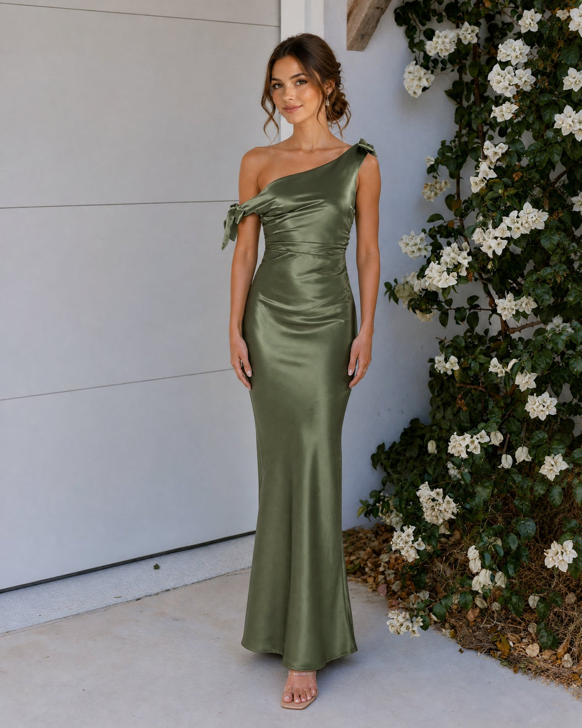 One-shoulder satin mermaid bridesmaid dress with cowl neckline and bow straps, olive green