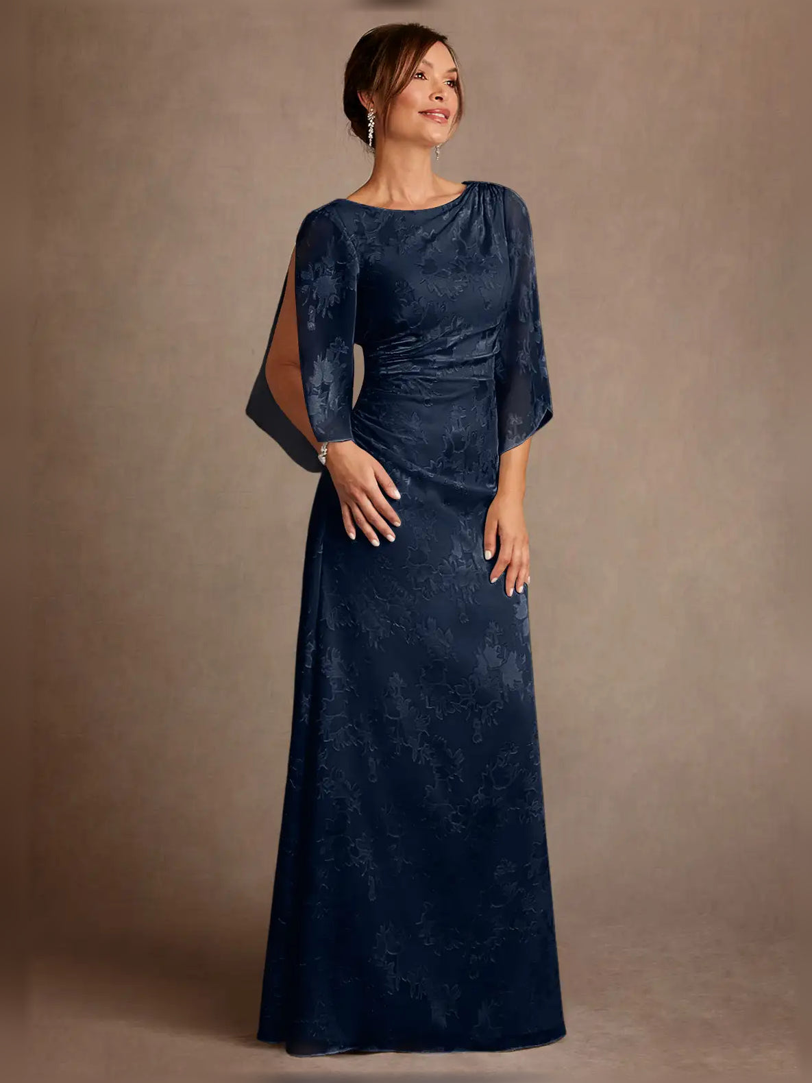 Navy blue ruched draped bateau neck column gown with 3/4 sleeves, floor length.