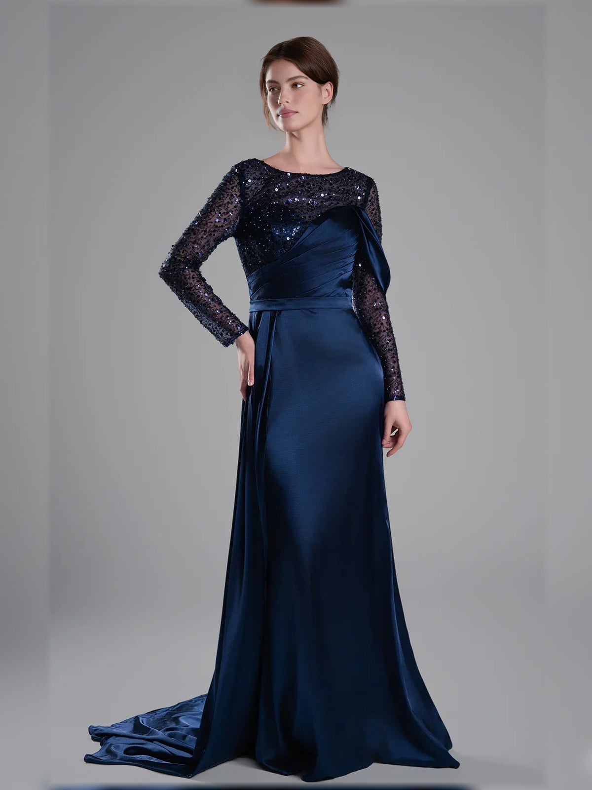 Navy blue long-sleeve floor-length formal dress with beaded sequin sleeves and sash-like waist