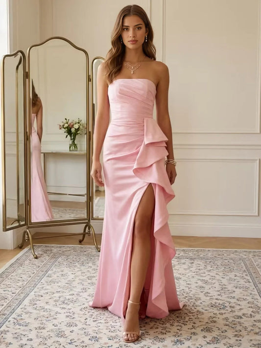 Blush pink strapless satin mermaid prom gown, ruched bodice, ruffled front leg slit