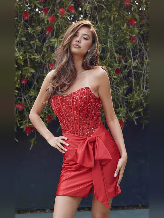 Crimson red strapless satin mini dress with ruched bodice and front draped bow detail