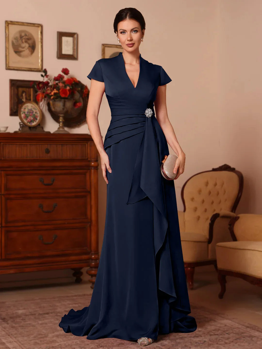 Dark navy satin mother-of-the-bride dress with beaded V-neck and draped ruffle skirt