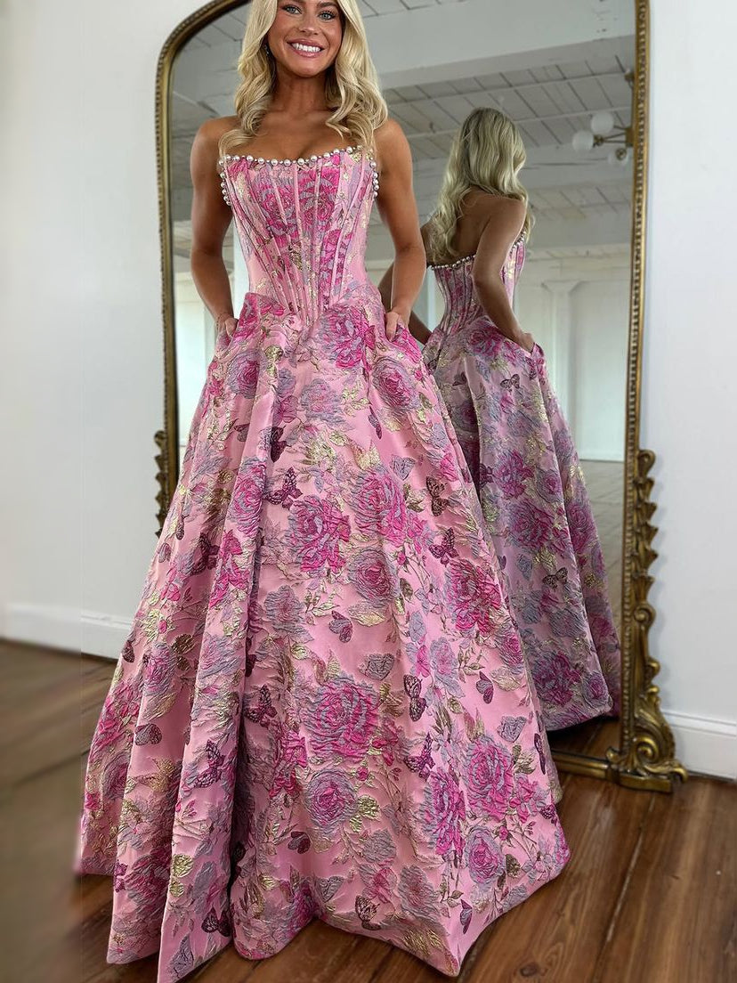Blush pink corset sweetheart maxi prom dress with A-line floral satin skirt, front view