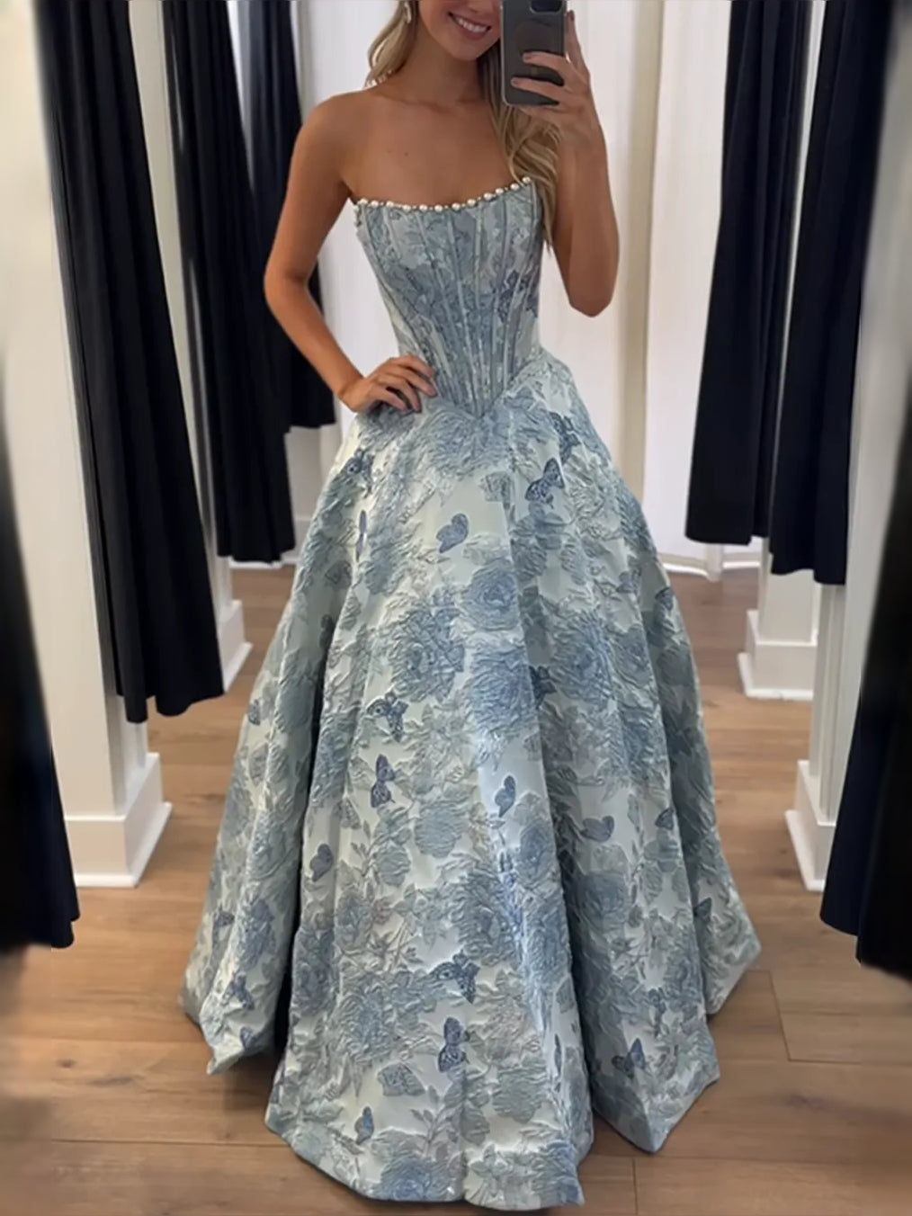 Dusty blue corset sweetheart maxi prom dress with A-line floral satin skirt, side view