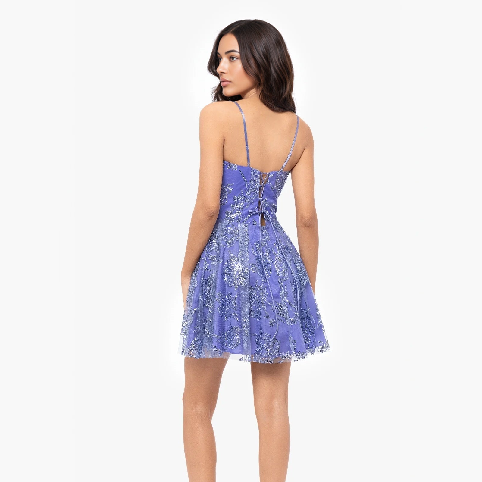 Back 3/4 view purple sequin corset homecoming dress with V-back spaghetti straps