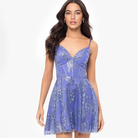 Purple sequin corset-style homecoming dress with spaghetti straps and sweetheart neckline