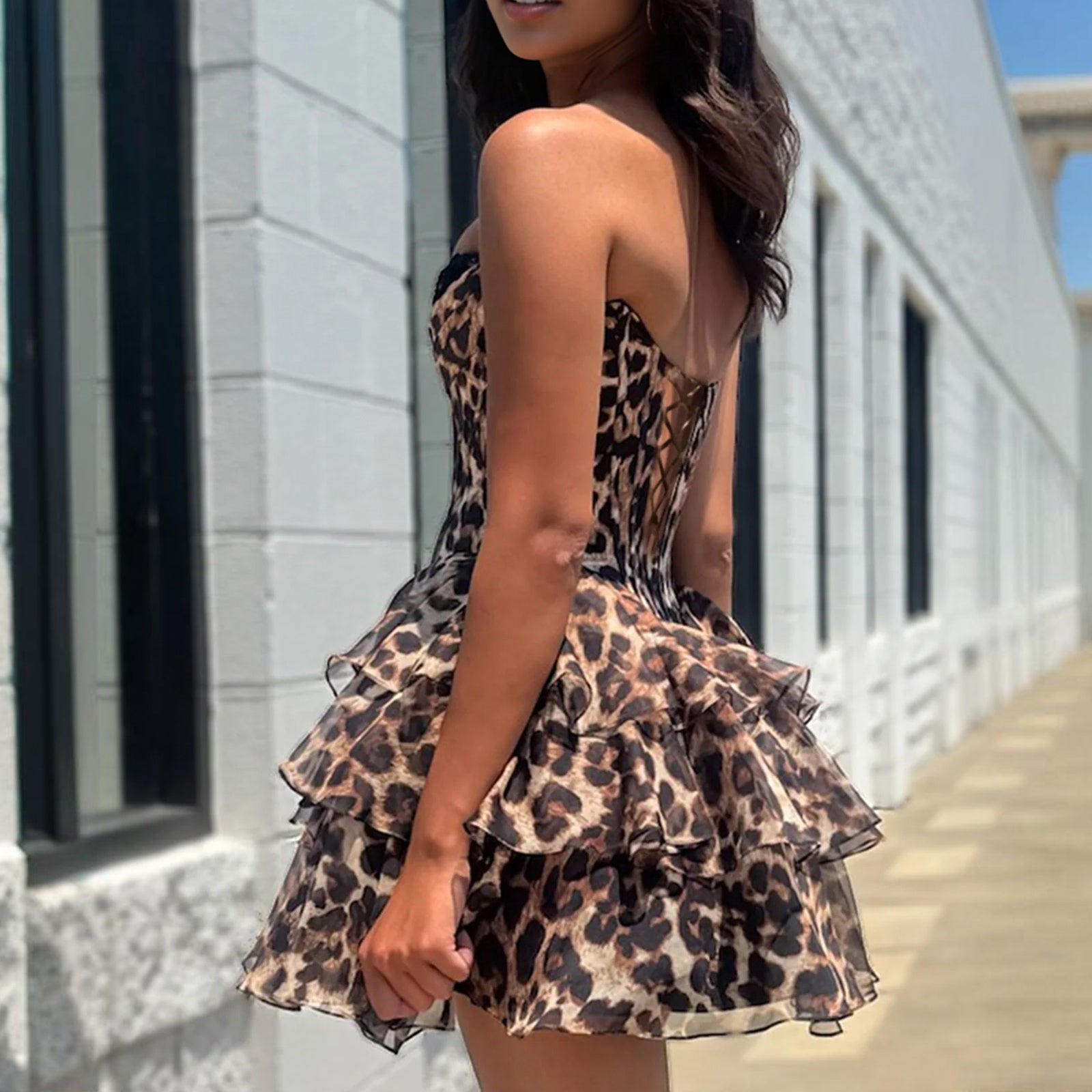 Leopard print corset dress with tiered ruffle skirt and open back