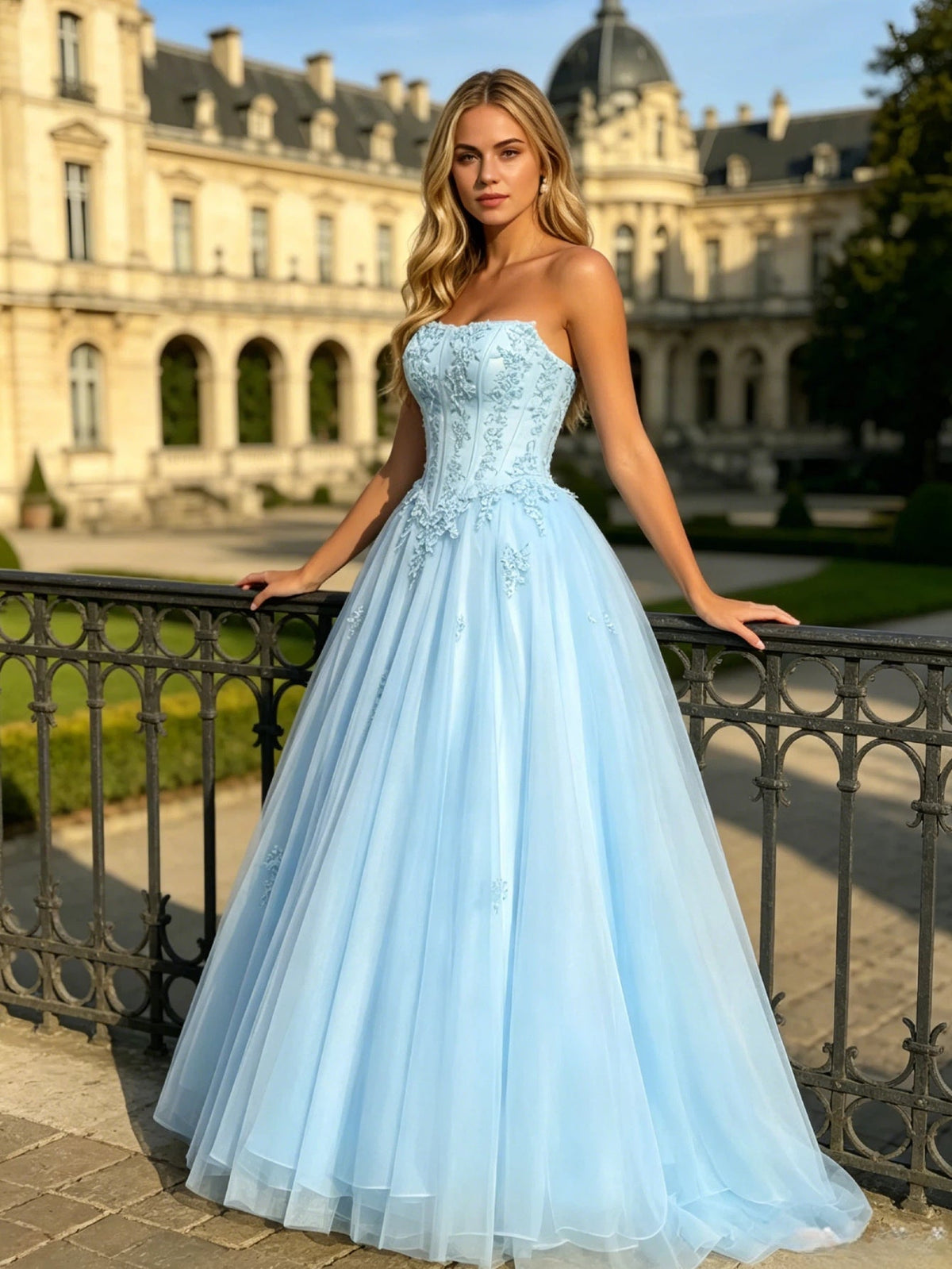 close-up of strapless lace corset ball gown with tulle a-line skirt highlighting corset and skirt detail.
