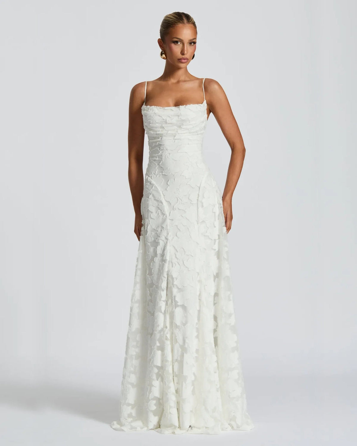 White floral lace A-line formal dress with fitted bodice and wide flared skirt