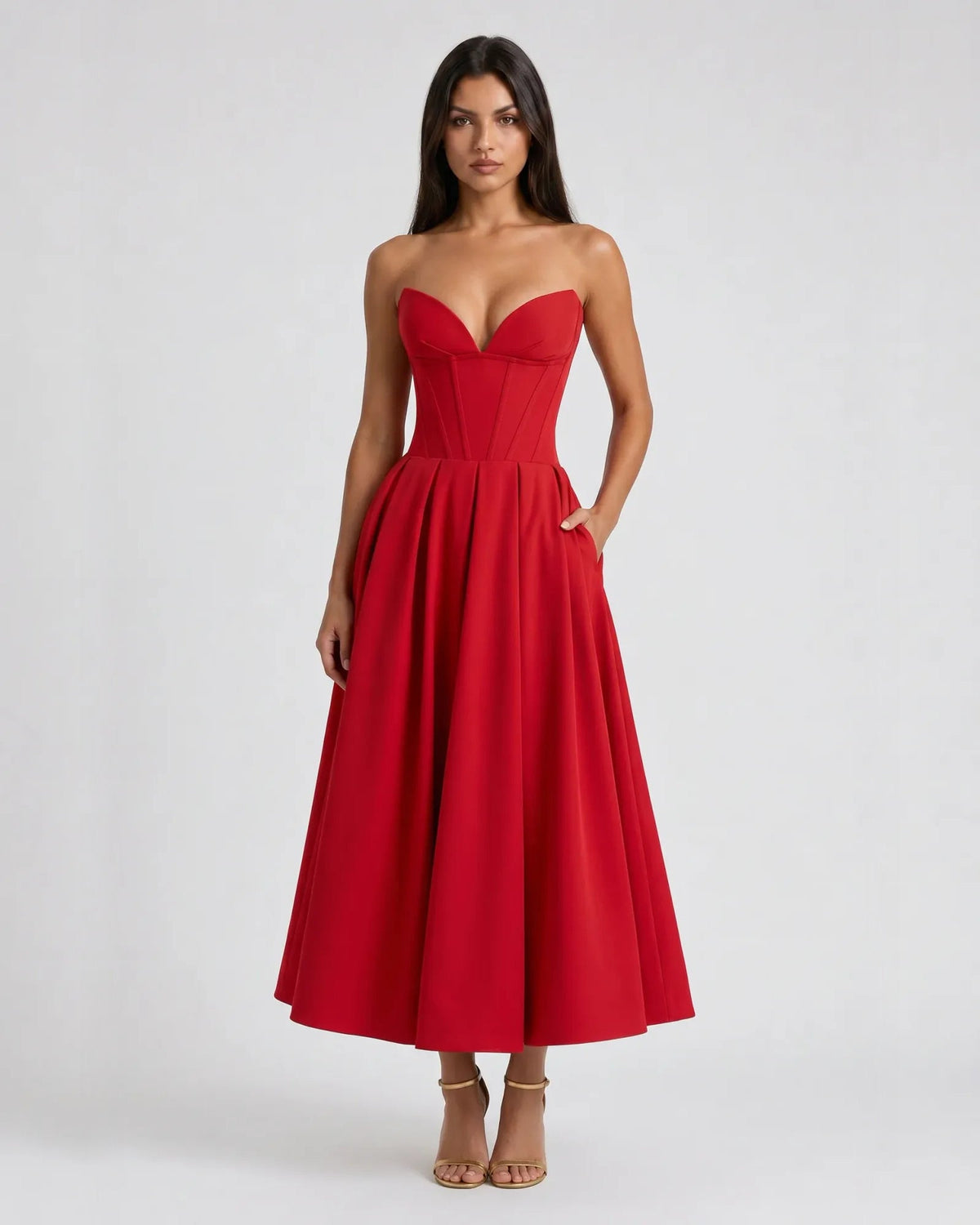Red strapless sweetheart corset midi formal dress with fitted bodice and flared skirt